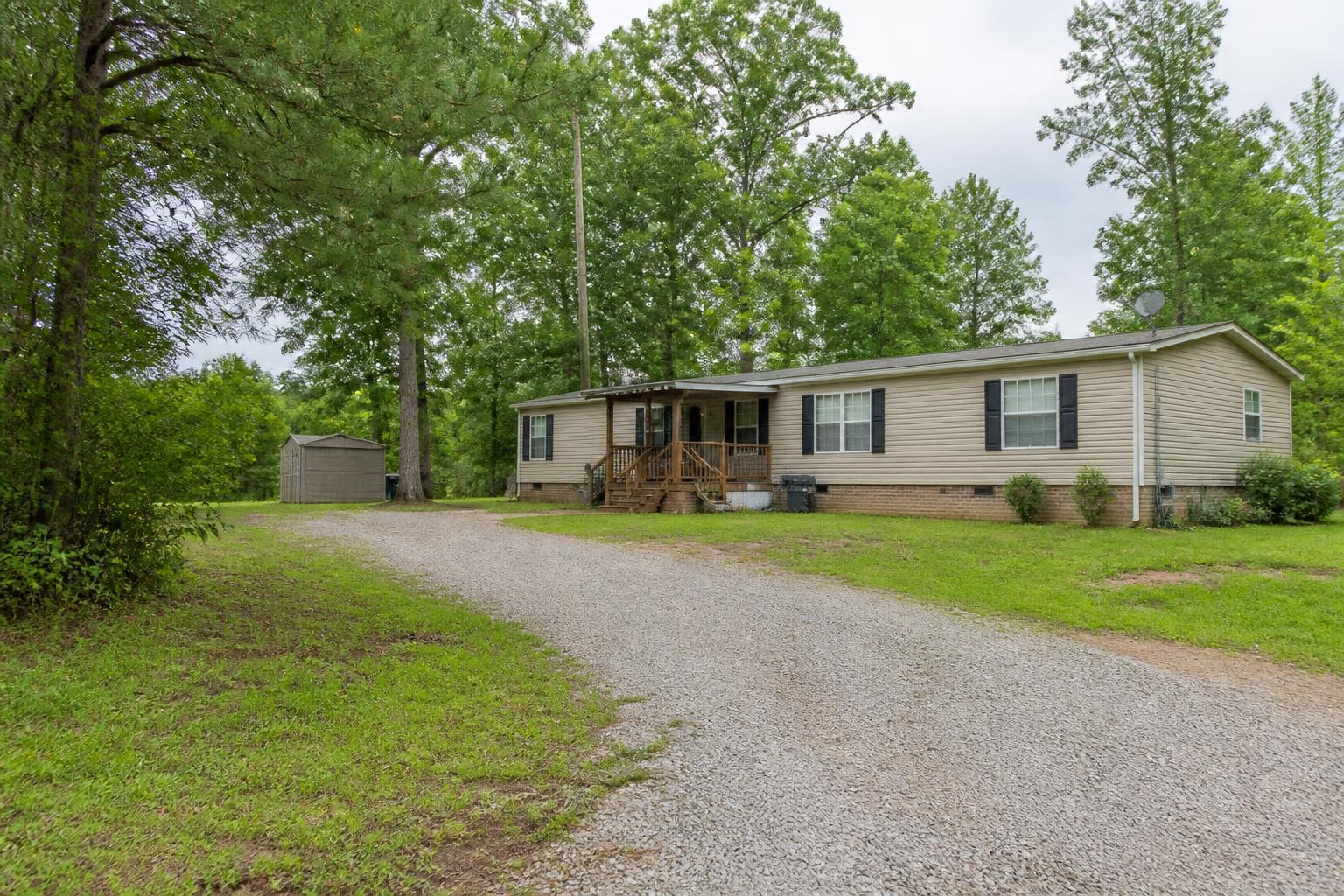 Manufactured home on a wooded North Mississippi property
